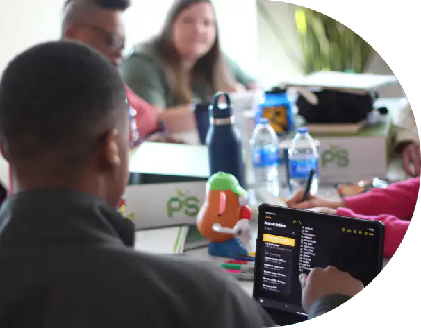 people on laptops at a table